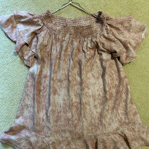 Romeo & Juliet Couture high-low off-the-shoulder ruffle top.